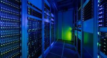 Picture of glowing light inside a data center.